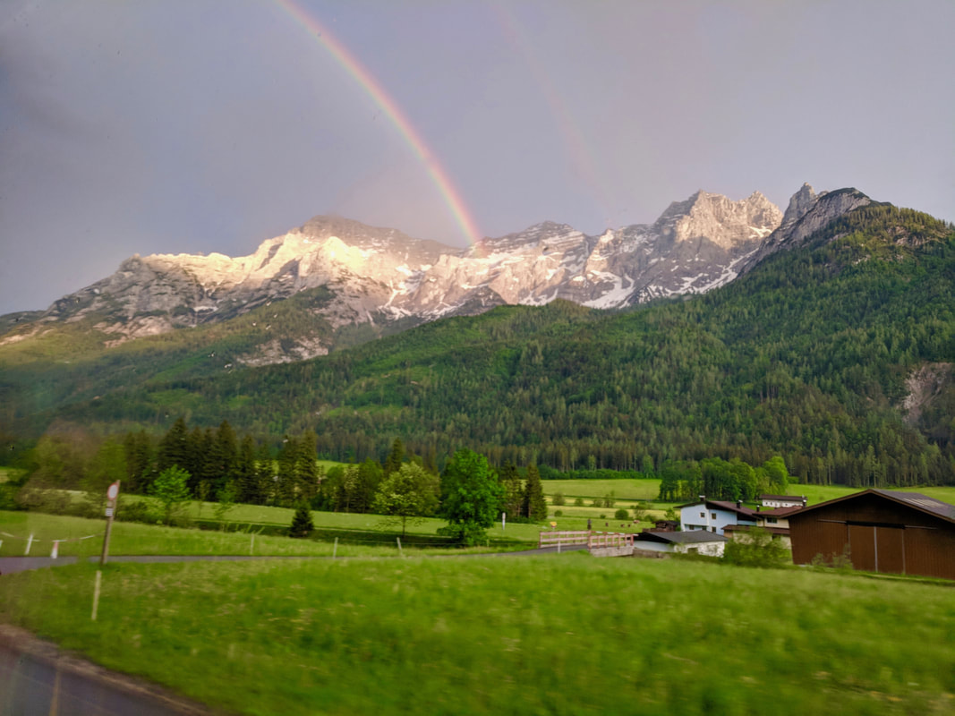 Picture rainbow over mountains in Austria